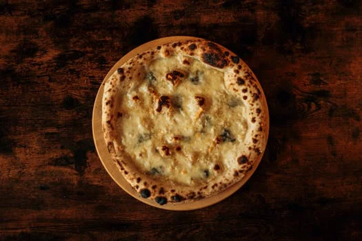 quattro formaggi pizza with four cheeses