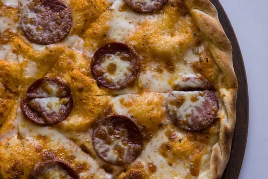 pepperoni pizza close up with cheese